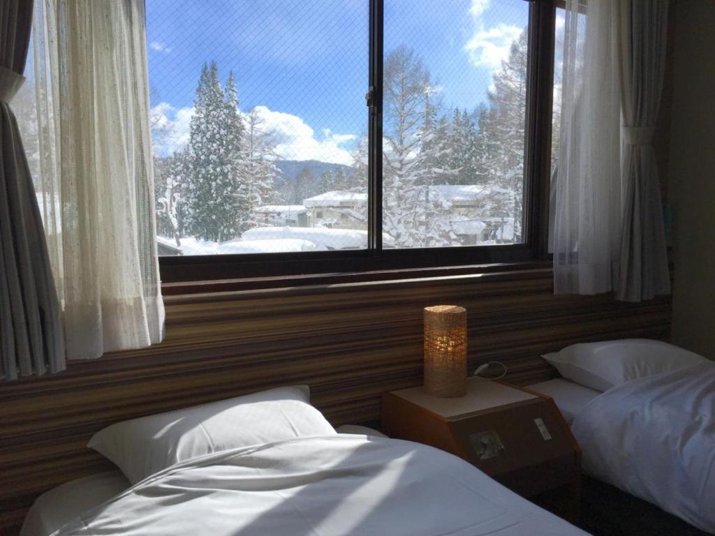 Hakuba Landmark Iwatake Lodge ภายนอก รูปภาพ